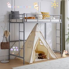 a child's bedroom with a bunk bed and teepee tent on the floor