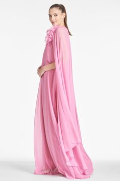 Elegant Pink Dress With Cape Sleeves, Elegant Pink Gown With Cape Sleeves, Pink Cape Sleeves Dress For Formal Occasions, Pink Dress With Cape Sleeves For Formal Events, Pink Formal Dress With Cape Sleeves, Pink Spring Evening Gown, Pink Evening Gown For Spring, Pink Cape Dress For Wedding, Evening Cape Dresses In Georgette