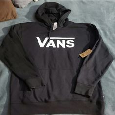 Layer Up When Temps Drop In The Vans Classic Pullover Hoodie. This Go-To Hoodie Has A Classic Construction With An Adjustable Drawstring Hood, A Kangaroo Pocket, And A Signature Vans Graphic On The Front. Solid Color Hoodie Vans Graphic Soft Fleece Fabrication Drawstring Hood Kangaroo Pocket Long Sleeves Ribbed Cuffs And Hem Machine Washable ***Brand New With Tags*** Vans Streetwear Hoodie, Vans Hoodie Sweatshirt For Streetwear, Vans Long Sleeve Sweatshirt For Streetwear, Vans Hooded Winter Sweatshirt, Vans Hooded Sweatshirt For Winter, Vans Casual Sweatshirt For Streetwear, Vans Sporty Streetwear Sweatshirt, Vans Sporty Sweatshirt For Streetwear, Vans Tops For Winter Streetwear