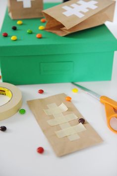 some crafting supplies are sitting on a table and ready to be put into the box