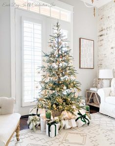 a decorated christmas tree with presents under it