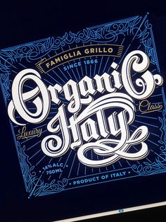 the label for organic hay is shown in blue and white lettering on a black background