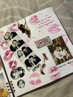 an open scrapbook with pictures and stickers on the pages that are covered in pink ink