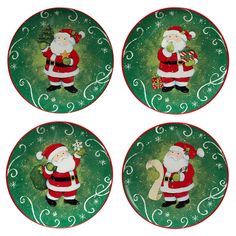 four plates with santa claus on them