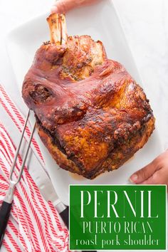 Pernil on a white serving platter. Green text box with white text that says "Pernil Puerto Rican roast pork shoulder in the bottom right corner of image. Spanish Pork Shoulder, Pork Shoulder Recipes Oven, Puerto Rican Roast Pork, Pork Shoulder Picnic Roast, Puerto Rican Pork, Pernil Recipe, Pork Shoulder Picnic, Roast Pork Shoulder, Spanish Pork