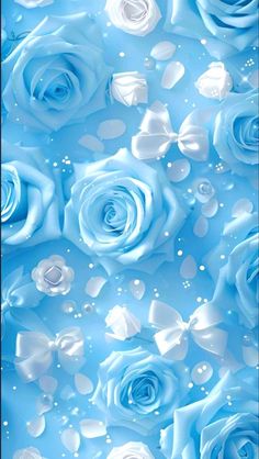 blue and white roses with water droplets on the petals are shown in this image, as well