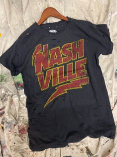 Nashville 1980's Distressed Unisex T Shirt - Etsy Edgy Distressed Crew Neck T-shirt, Pre-washed Short Sleeve Grunge T-shirt, Faded Washed Band Merch T-shirt, Distressed Acid Wash Band Merch T-shirt, Vintage Washed Black T-shirt For Concert, Grunge Acid Wash Distressed T-shirt, Distressed Band Merch T-shirt With Crew Neck, Concert Distressed Washed Black T-shirt, Vintage Faded T-shirt Pre-washed