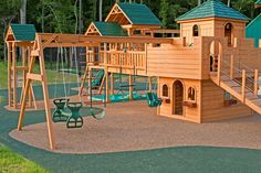 a wooden play set with swings and slides