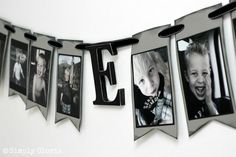 the word love is spelled with photos hanging from clothes pins