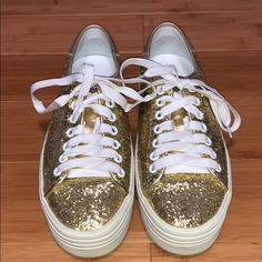 Saint Laurent Gold Glitter Sneakers Size 6 Color - Gold Glitter Condition - Like New- Excellent Stand Out In A Crowd While Wearing These Stunning Sneakers. Feel Free To Ask Any Questions! Comes Exactly As Shown In Photos Gold Low-top Platform Sneakers, Metallic Glitter Lace-up Sneakers, Metallic Low-top Sneakers With Glitter Accents, Party Low-top Sneakers, Gold Low-top Sneakers With Glitter Accents, Casual Shimmer Sneakers With Round Toe, Gold Round Toe Sneakers For Party, Trendy Gold Sneakers For Party, Gold Leather Party Sneakers