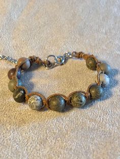 Jasper beads braided with brown waxed cotton cord. Adjustable 6.5-8.25 inches. Great for everyday Brown Macrame, Macrame Bracelet, Jasper Beads, Macrame Bracelets, Cotton Cord, Waxed Cotton, Macrame, Braids, Wax