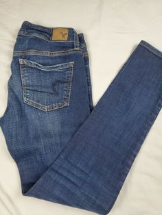 American Eagle Super Strech Jegging Hi-Rise Women Size 2 Regular . Condition is Pre-owned. Shipped with USPS Priority Mail. It has a little stretch in one leg only still very good condition and fast shipping 60138 American Eagle Bell Bottom Jeans, Cheap Pull-on Women's Jeggings, High Rise Non-stretch Medium Wash Jeggings, Americab Eagle Jeans, Medium Wash Full-length Denim Jeggings, Blue Pants, Jeggings, Priority Mail, Levi Jeans