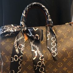 Two Black Ivory Chain Link Design Twilly Handle Covers Gorgeous Classic Black Design Goes Great With Brown Monogram Colors And Of Course Lots Of Other Purses Scarf Is Approx 37” Long And 1 1/2” Wide Looks Great On My Lv Speedy Bag ( Purse For Demonstration Purposes Only) Have Other Sets If You Want Additional Scarf Twilly Will Protect The Handles Of You Louis Vuitton Boston Coach Alma Celine Birkin Mk Kate Spade And Many Others Scarf Twilly, My Little Pony Backpack, Speedy Bag, Beaded Clutch Purse, Brown Clutch, Lv Speedy, Betsey Johnson Purses, Leather Billfold, Louis Vuitton Wallet Zippy