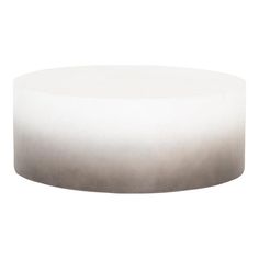 a white and grey ombreed round table on a white background