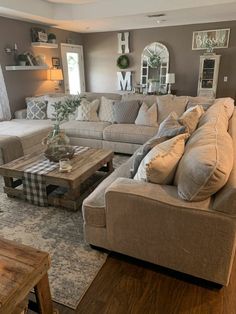 a living room filled with furniture and decor