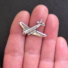 Airplane antique silver tone charms, in a zinc alloy metal. Perfect for bracelets, pendants, earrings, zipper pulls, bookmarks and key chains! Measurements: 27mm x 30mm Hole Size: 2mm. You will receive 5 charms. Need more? Just send us a message through the contact us form, instant chat, or at mailto:info@bohemianfindings.com. Bulk pricing is available! All of our products are lead free and nickel safe. As they contain small parts, all items are for adult jewelry/craft making use only, not inten Wedding Stationary, E Bay, Bead Charms, Crafts To Make, Jewelry Crafts, Zinc Alloy, Antique Silver, Heart Ring, Silver Tone