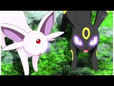 two pokemon characters standing next to each other in front of green grass and rocks with glowing eyes