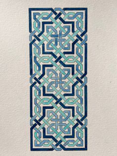 a blue and white design on the side of a piece of paper that has been drawn