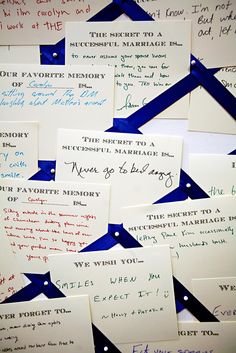 several pieces of paper that have been written on them with blue tape and some other writing