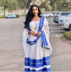 A Traditional Kemis Luxury White Habesha Kemis For Traditional Ceremonies, Luxury Festive Women's Habesha Kemis, Luxury White Habesha Kemis With Traditional Patterns, Luxury Ceremonial Habesha Kemis With Traditional Patterns, Zuria Habesha Dress, Eritrean Clothing, Black Women Hair Color, Eritrean Dress, Ethiopian Wedding