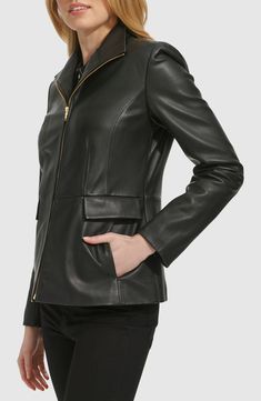 Elevate your cool-weather looks with this lambskin-leather jacket cut in a streamlined silhouette and topped with a contemporary stand collar. 25 1/2" length (size Medium) Front zip closure Stand collar Front on-seam pockets with decorative flap Lined Leather Professional leather clean Imported Collar Leather Jacket, Wing Collar, Stand Collar Jackets, Leather Outerwear, Lambskin Leather Jacket, Leather Jacket Black, Leather Moto Jacket, Trucker Jacket, Black Fits