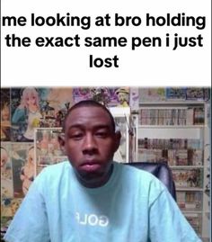 a man sitting in front of a computer screen with the words me looking at bro holding the exact same pen i just lost