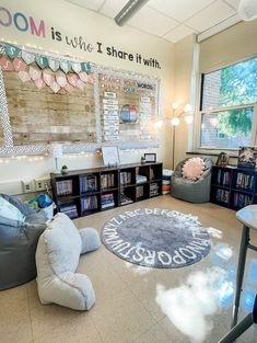 a room that has a rug on the floor and some bookshelves in it