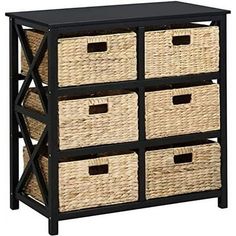 a black and white shelf with baskets on the bottom, and two wicker bins below it