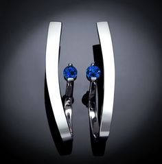 "Sapphire Earrings - Chatham Blue Sapphire - Argentium Silver  - 2001 Bold and geometric, modern and elegant, these dramatic earrings frame the face beautifully. Make a statement with this contemporary design handcrafted by award winning designer, David Worcester.  Cast in Argentium 960 premium quality, 100% recycled silver, this specially processed piece measures 37mm X 8mm or 1 1/2 inches X 5/16 inches, and is set with two beautiful 4mm Chatham Blue Sapphires. PLEASE LOOK AT THE MEASUREMENTS C Earring Frame, Dramatic Earrings, Yucca Valley, Contemporary Earrings, Citrine Earrings, January Birthstone, Garnet Earrings, Ruby Earrings, Argentium Silver