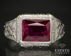 Handsome early 1900's mens band ring with a 9mm by 7mm lab ruby bezel set which is common for this era of jewelry. Carved floral designs into the setting. Stamped 14k. SIZE-10.5 Formal Hallmarked Ruby Ring In Platinum, Formal Hallmarked Platinum Ruby Ring, Classic White Gold Ruby Ring With Polished Finish, Vintage Gia Certified Ruby Ring For Formal Occasions, Classic Ruby Ring With Polished Finish For Formal Occasions, Fine Jewelry Ruby Signet Ring For Formal Occasions, Classic Silver Gia Certified Ruby Ring, Ruby Signet Ring Fine Jewelry For Formal Events, Formal Ruby Signet Ring In Fine Jewelry Style