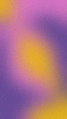 a blurry image of an orange and purple background