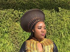 "In Zulu language \" Isicholo\" is a traditional hat made by rural women in South Africa. It was worn for special occasions but with the African fashion trending this hat can we worn for casual and formal events. The Zulu hat is handcrafted out of traditional cloth and set with patterns woven onto the fabric. It is available in a variety of colours. The large Zulu hat has a circumference of 130-140cm on the wide part and the head space 55-60cm. It has draw strings at the back to adjust the fit s Traditional Brown Hat With Short Brim, Black Brimmed Hat For Ceremonial Occasions, Traditional Brown Sun Hat With Short Brim, Traditional Ceremonial Hats With Short Brim, Traditional Brown Brimmed Straw Hat, Traditional Black Brimmed Hat, Traditional Hat With Adjustable Structured Crown, Traditional Hat With Adjustable Fit And Structured Crown, Traditional Hat With Structured Crown And Adjustable Fit