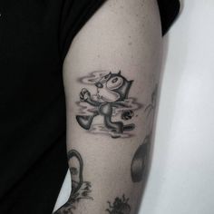 a person with a tattoo on their arm