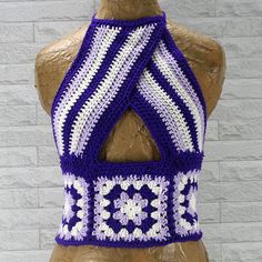 a crocheted halter top on a mannequin