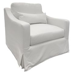 a white chair with two pillows on it