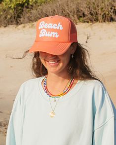 Introducing our Beach Bum Trucker Hat, the perfect accessory for beach days! Designed with a breathable mesh back and an adjustable strap, this hat guarantees a comfortable fit for all head sizes. Product Details Unisex One Size Fits All Adjustable Strap Made with Love Us Beaches, Coral Blue, Love Is Free, Beach Bum, Beach Days, Coral Color, Navy Color, Made With Love, Beach Day