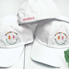 These pretty pastel birthday hats are a fun choice for you and your birthday squad! Personalize your birthday hats with the design and custom text of your choice.  These designs are available on our small fit hats (recommended for ages 5 - small adult) or our classic adult hats.  𝗗𝗘𝗦𝝞𝗚𝝢𝗦 * Birthday Girl * Birthday Squad 𝗣𝗘𝗥𝗦𝗢𝗡𝗔𝗟𝗜𝗭𝗘 𝗜𝗧 * Optional: Add 1 name or 1-2 lines of short custom text to the back 3.00 per hat)  (12 characters per name or 25 characters per line maximum) Playful White Baseball Cap For Spring, White Novelty Party Hat, Trendy Pink Hat For Birthday, Trendy White Mini Hat For Party, Summer Birthday Snapback Hat, Summer Snapback Hats For Birthday, White Snapback Hat For Party, White Playful Adjustable Hat, Playful White Hat With Curved Brim