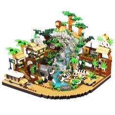 a lego model of a zoo with animals and trees