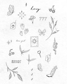 an image of various tattoos drawn on paper