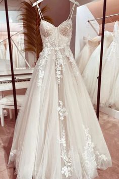 a wedding dress on display in a store