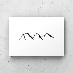 three birds flying in the sky with mountains behind them