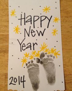 a happy new year card with two feet and stars