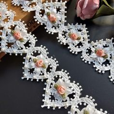 PRICES MAY VARY. Color: White ; Material: Milk Fiber, Chiffon, Fabric, Pearls Per One Size: 5*6cm(1.97*2.36inches); The Diameter of Pearl: 0.5cm(0.2") Length: 1 Yard (1 yard has about 18 flowers) Vintage style ribbon decorated;Ideal for clothing, costume, dress, curtain DIY sewing. With fine workmanship, looks delicate and elegant. Color: White ; Material: Milk Fiber, Chiffon, Fabric, Pearls; Per One Size: 5cm*6cm(2" * 2-1/3"); The Diameter of Pearl: 0.5cm(0.2"); Length: 1 Yard (1 yard has about Lace With Pearls, Handmade Wedding Decorations, Handmade Curtains, Corded Lace Fabric, Craft Wedding, Modern Crochet, Sewing Art, Sewing Trim, Pearl Flower