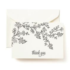 a thank card with flowers on it and the words thank you written in black ink