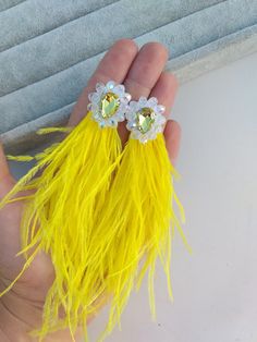 Yellow white earrings with ostrich feathers, yellow long tassel ostrich, yellow fluffy earrings, ostrich feather jewelry yellow earrings by MarineAccessories on Etsy Yellow Fringe Jewelry For Party, Elegant Yellow Fringe Earrings, Elegant Yellow Tassel Earrings For Summer, Summer Party Earrings With Feathers, Feather Party Jewelry For Summer, Fluffy Earrings, Boho Wedding Earrings, Ivory Earrings, Feather Wedding