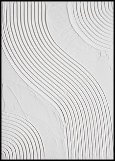 an abstract white background with wavy lines on the wall and below it is a circular design