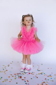 Introducing our Exquisite Pink Tutu Dress for Kids and Babies - A Magical Fairy Dress Delight! Prepare for enchantment with our meticulously crafted Pink Tutu Dress. Perfect for 1st-year birthdays, Halloween, festivals, special occasions, adorable toddler girl costumes, and as a stunning first birthday dress, this creation is a true showstopper. 👑 Unmatched Comfort: Soft Tutu on the outside, cotton lining on the inside. No itching or irritation, just pure comfort for your little fairy. 🌟 Tailored Perfection: Fully customizable for a perfect fit. Adjustable straps and elastic waist ensure your baby girl feels comfortable and looks amazing. 💖 Superior Craftsmanship: Sewn with love, this fairy dress stands out from the crowd. ✨ Unveiling the Extraordinary: 1️⃣ Premium Quality: Finest fabri Playful Ruffled Tutu Dress, Playful Ruffled Tutu Dress In Tulle, Playful Ruffled Tulle Tutu Dress, Fairy Style Princess Dress With Ruffles For Dress-up, Easter Birthday Princess Dress With Ruffles, Cute Ruffle Fairy Dress For Party, Whimsical Ruffled Fairy Dress For Dress-up, Whimsical Ruffled Fairy Dress For Party, Cute Fairy Dress With Ruffles For Party