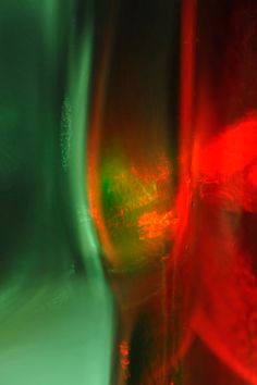 an abstract photograph of red and green lights