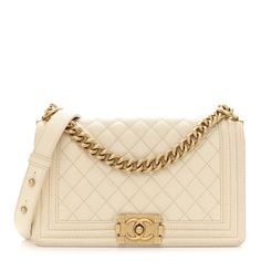 This is an authentic CHANEL Caviar Quilted Medium Boy Flap in Ivory. This stylish shoulder bag is crafted of luxurious diamond quilted caviar leather in cream framed by linear quilting. The handbag features a light gold chain-link shoulder strap with a leather shoulder pad and a polished light gold push lock. The crossbody opens to a matching fabric interior with a patch pocket. Luxury Shoulder Bag With Diamond Quilting For Everyday, Luxury Cream Shoulder Bag, Luxury Everyday Cream Bag, Luxury White Quilted Shoulder Bag, Elegant White Quilted Bag, Luxury Cream Shoulder Bag For Formal Occasions, Luxury Cream Shoulder Bag For Formal Events, Elegant Everyday Luxury Quilted Shoulder Bag, Luxury Rectangular Shoulder Bag With Diamond Quilting