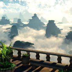 a balcony with potted plants and mountains in the background on a foggy day